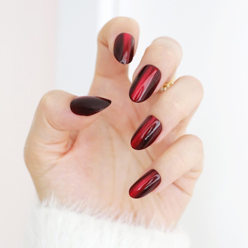 red cat eye nails