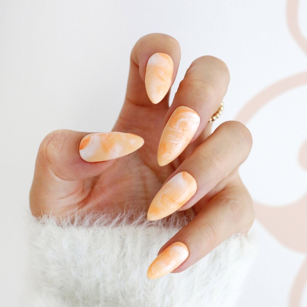 orange marbled fall nails