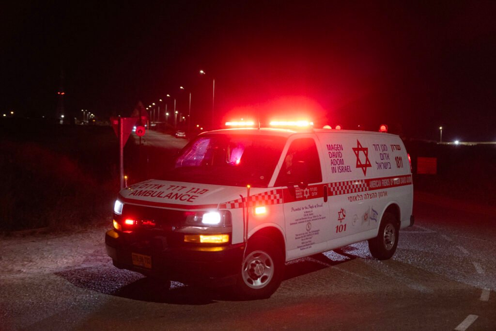 An ambulance leaves the scene of a drone strike near the northern Israeli town of Binyamina, on October 13, 2024, amid the continuing war between Israel and Hezbollah. | Photo by Oren ZIV / AFP